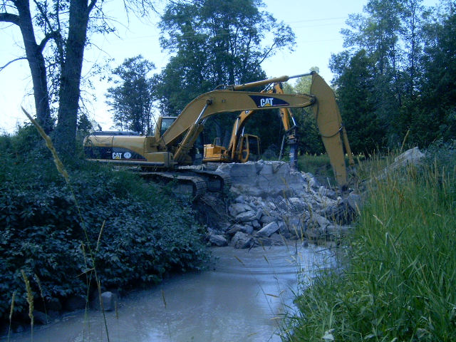 Removal of existing concrete bridge